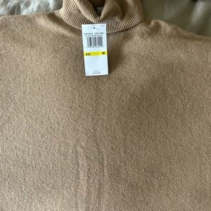 Michael Kors cashmere poncho. The grey one is no longer available.